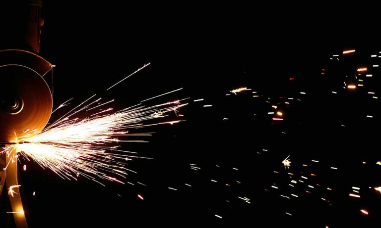 Sparks flying as a piece of steel is cut